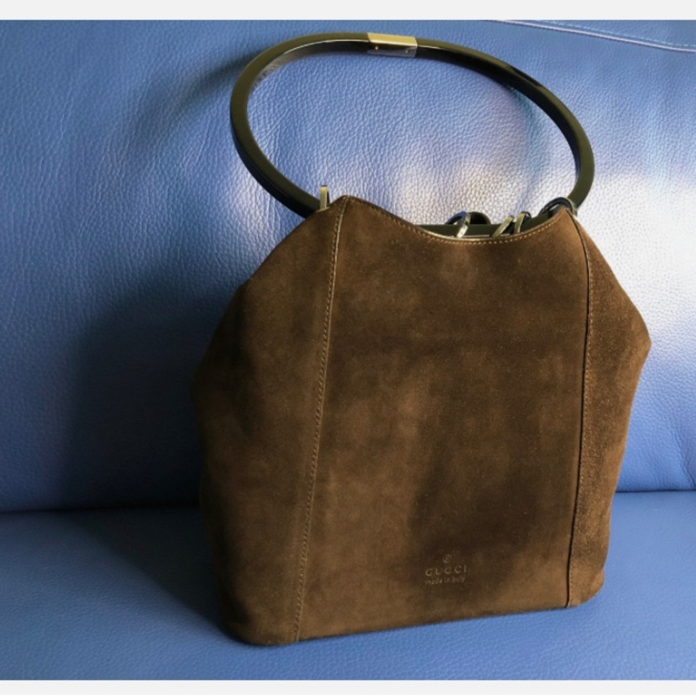 Used Vintage Gucci Brown Ring Handle suede handbag. Inside zipped pocket.